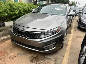 Kia Optima SXL Turbo Sedan (2.0 L 4cyl 6A) 2013 Beige