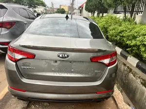 Kia Optima SXL Turbo Sedan (2.0 L 4cyl 6A) 2013 Beige