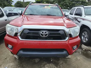 Toyota Tacoma V6 4dr Double Cab 4WD 6.1 ft. SB (4.0L 6cyl 5A) 2015 Red
