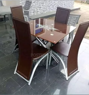 Quality Glass Dining Table and 4 Chairs.