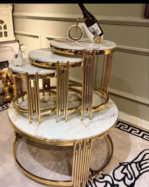Imported Center Table and Stools With Marble Tops.