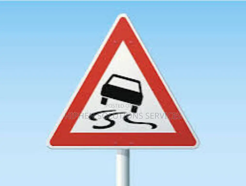 Warning Slippery Roads Sign