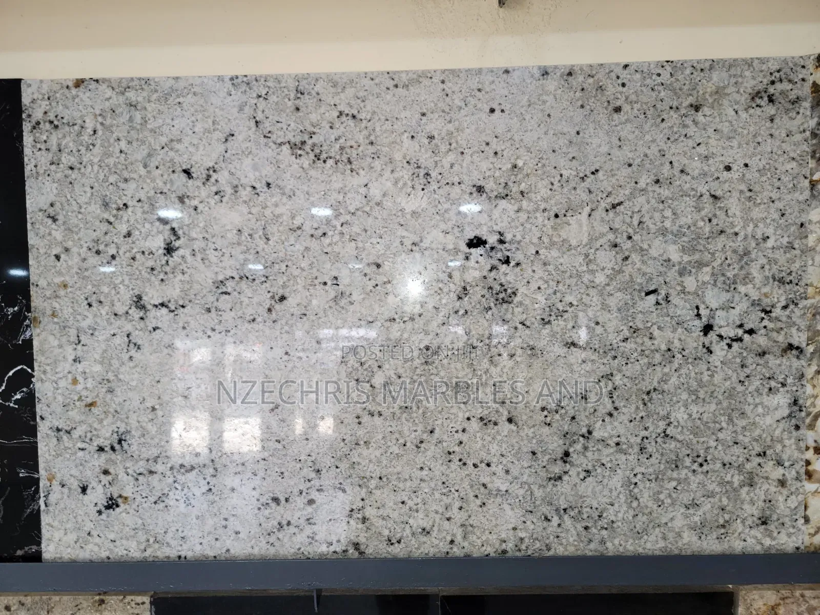 Casmir White Granite Tiles
