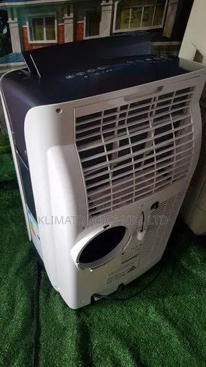 Powerful 1hp Mobile Ac + Accessories