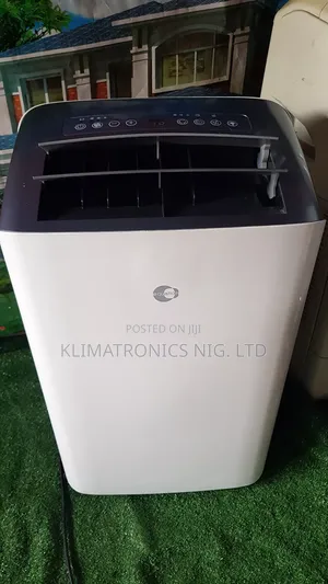 Powerful 1hp Mobile Ac + Accessories