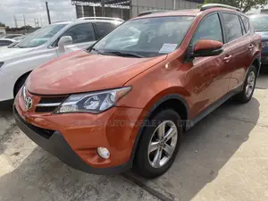 Toyota RAV4 XLE AWD (2.5L 4cyl 6A) 2013 Orange