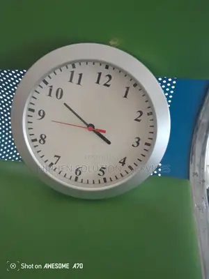 Photo - Portable Wall Clock Spy Camera for Home and Office Security