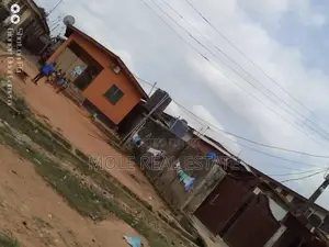 Half Plot of Land by Kwara Bustop Fenced