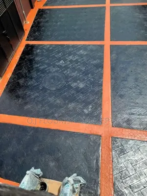 Black And Orange Stamped Concrete Shinning