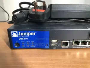 JUNIPER NETWORKS SRX210 With Power Adapter