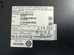 JUNIPER NETWORKS SRX210 With Power Adapter