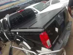 Nissan Frontier Boot Cover Fiber Folding - _%'=