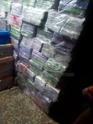 Dozen Packs of Exercise Books