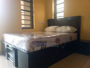 A Standard 4.5ft by 6ft Bedframe With 10inches Mattress