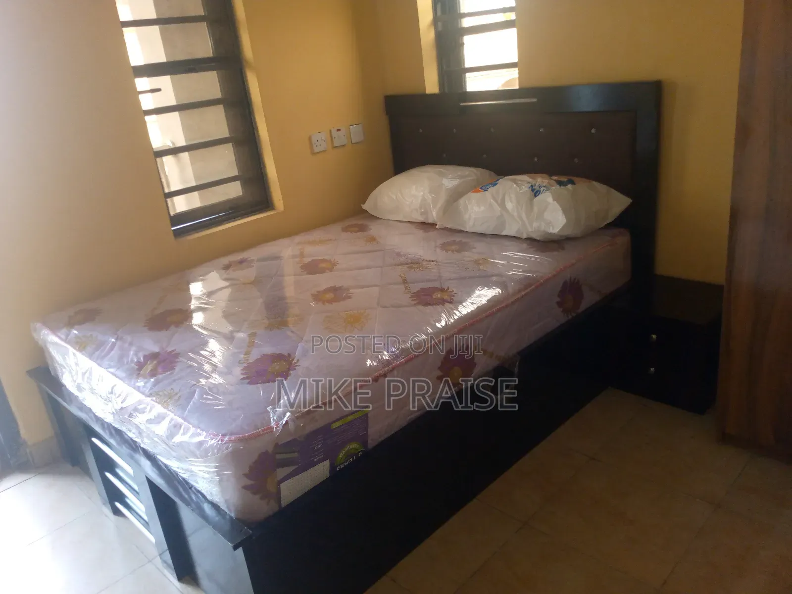 A Standard 4.5ft by 6ft Bedframe With 10inches Mattress