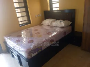 A Standard 4.5ft by 6ft Bedframe With 10inches Mattress