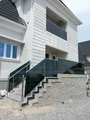 Transform Your Balcony With Dark Grey Glass"