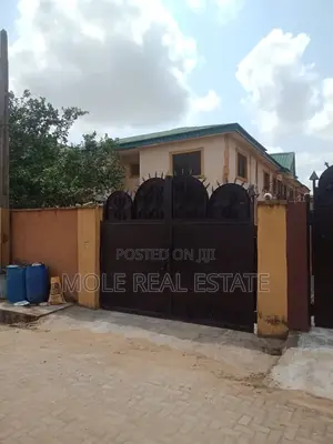 30ft by 80ft Half Plot Abaranje Beside De Royale Hotel
