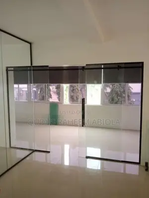Frameless Glass Partition With Black Accessories