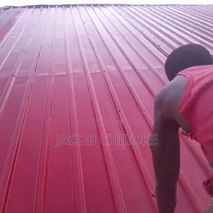 Washing and Recoating Faded Roofs