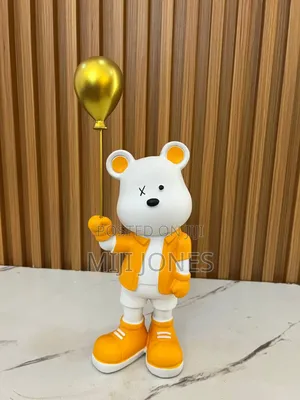 Orange Teddy With a Balloon