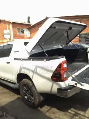 Both Cover Hilux Rolling Cover and Carry Boy