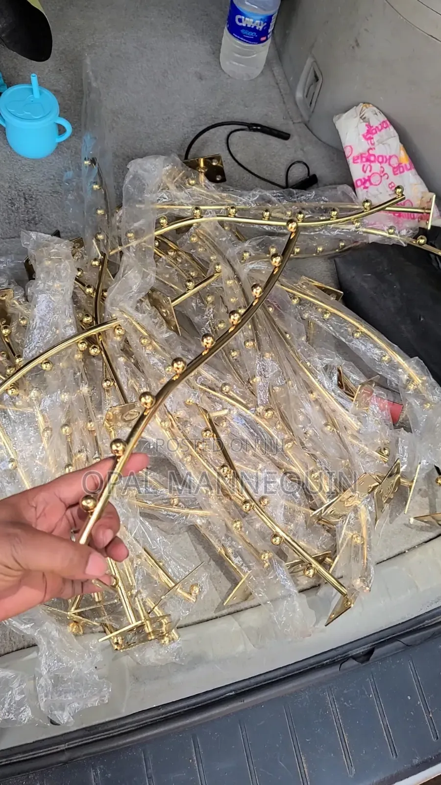 Gold 9 Pin Wavy Wall Hanger