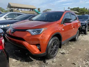 Toyota RAV4 LE AWD (2.5L 4cyl 6A) 2016 Orange