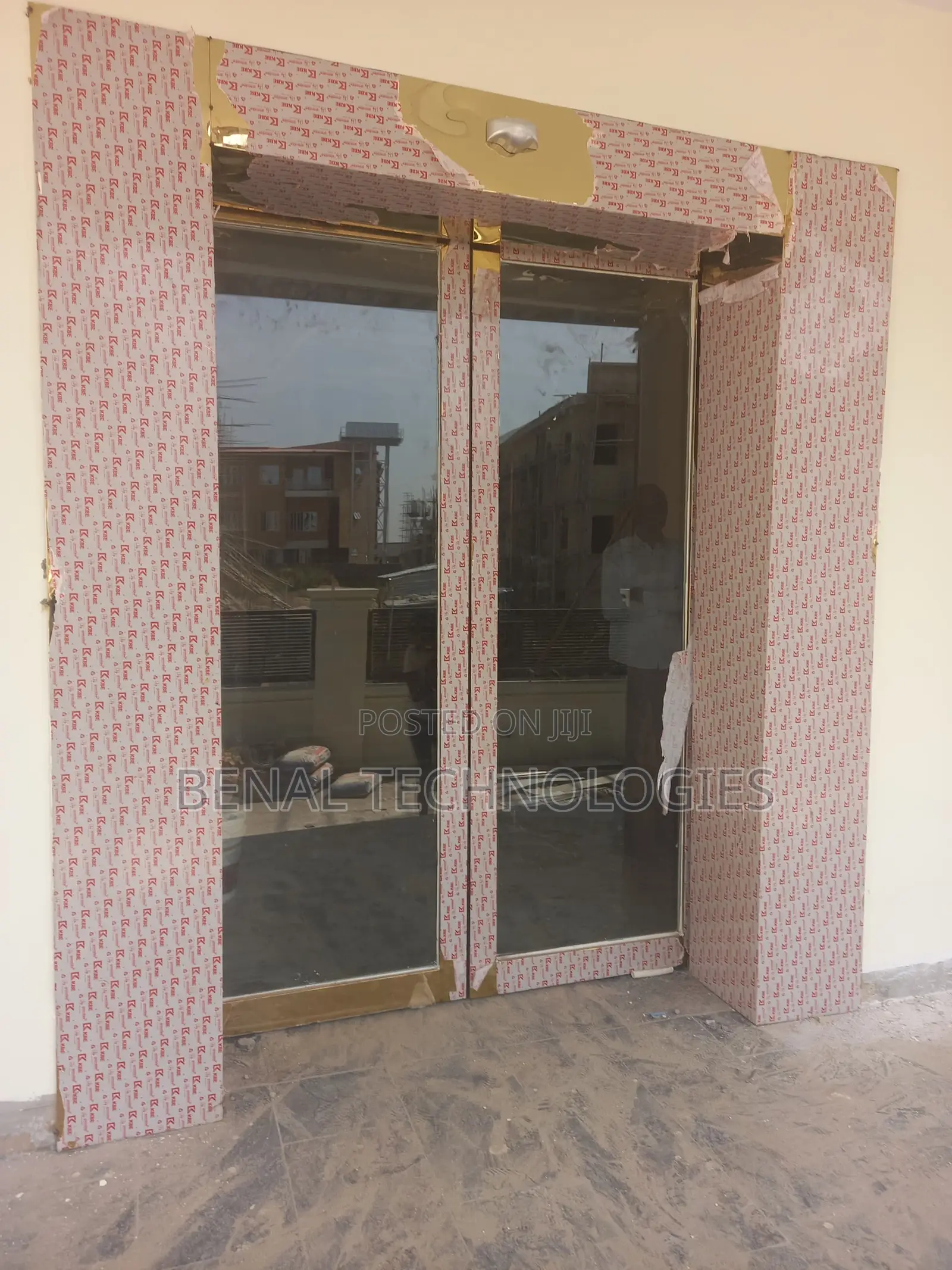 Sensor-Driven Entry With Sliding Glass
