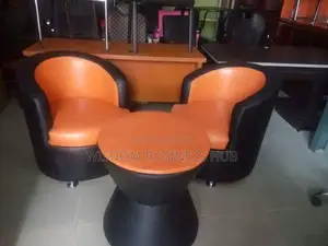Two Singles Seater Bucket Chairs With Center Table