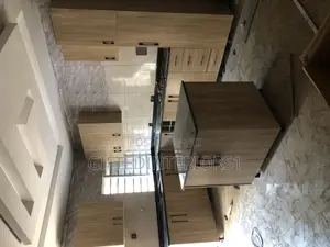Kitchen Cabinets, Islands With Marble Top And Inbuilt Cooker