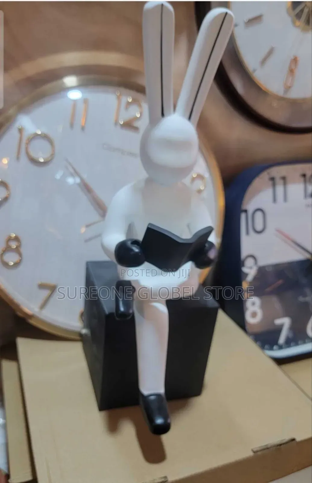 White Rabbit, Perched on a Black Cube