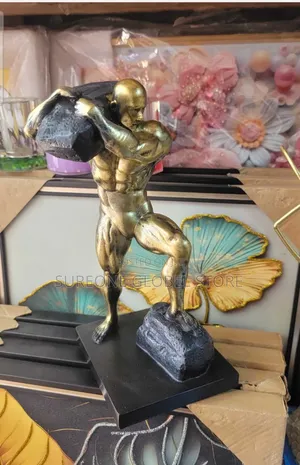 This Powerful Sculpture Depicts a Muscular Man,