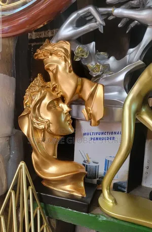 Elegant Sculpture Depicts a Couple in a Passionate Embrace