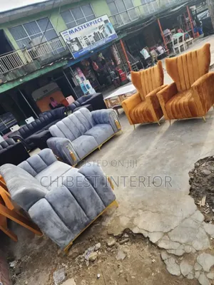 A Set of Sitting Room Sofa Chairs.