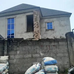 A Sixteen Self Contain Storey Building for Sale at UMUCHIMA