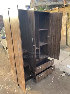 Wardrobe With Three Doors and Drawers