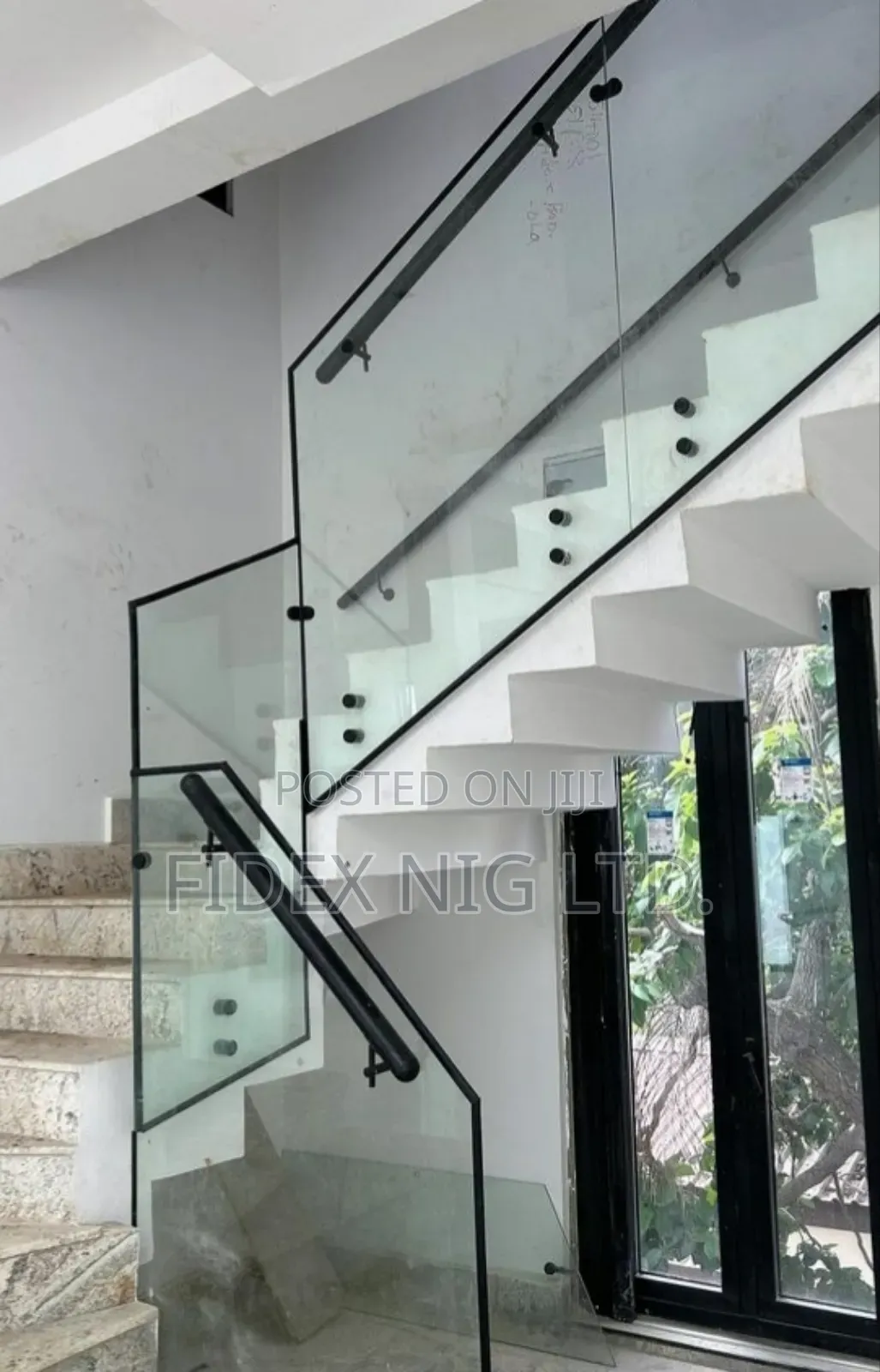 Glass Staircase With Black Accessories