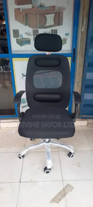 Photo - Portable Office Chair Swivel With Headrest.