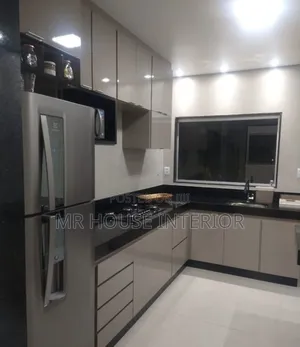 Kitchen Cabinet With Spoon and Plates Rags Available