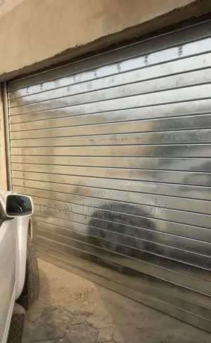 Tunable Shutter Garage Door Mechanisms