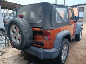 Jeep Wrangler Unlimited Sport 2010 Orange