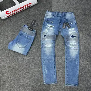 Photo - Original Luxury Men's Jeans  Trousers Balmain Available