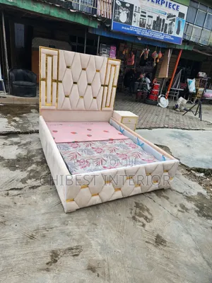 A Padded 4.5by6 Bed With Its Drawer