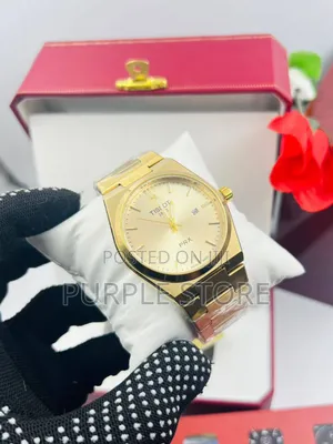 Tissot PRX Wristwatch Gold