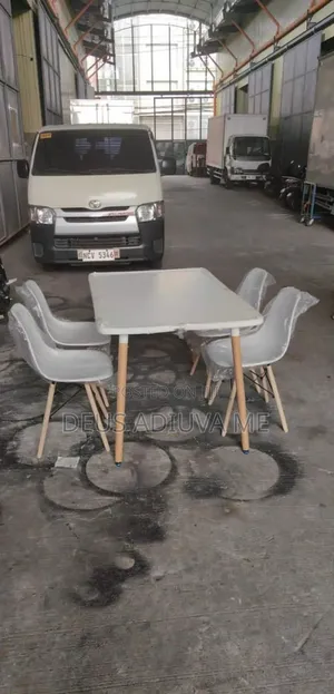 Classic Plastic Dining Table and Chairs With Wooden Legs