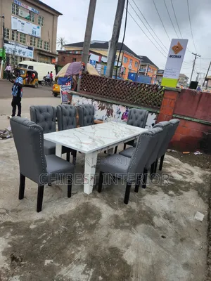 8 Seaters Dining Made With Quality Leather and HDF Glossy