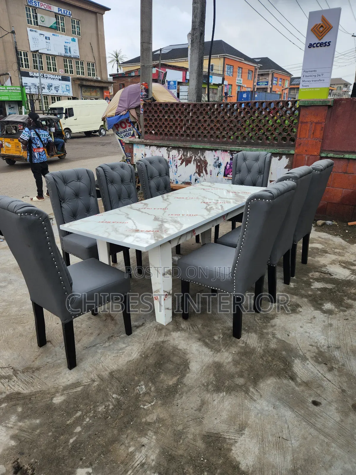 HDF Gloosy Board With 8 Seaters Leather Sofas.