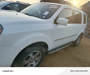 Honda Pilot Touring w/RES/Navi 4WD (3.5L 6cyl 5A) 2011 White