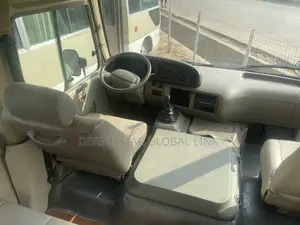 Toyota Coaster 2011 Gold
